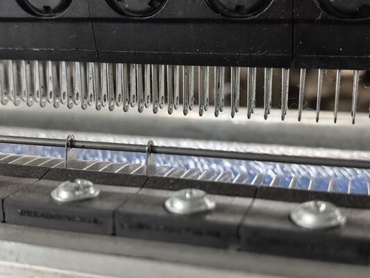 Understanding the Role of Guide Bars in Warp Knitting Machines